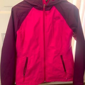 Like new, North Face rain jacket with hood. Pink with eggplant sleeves.